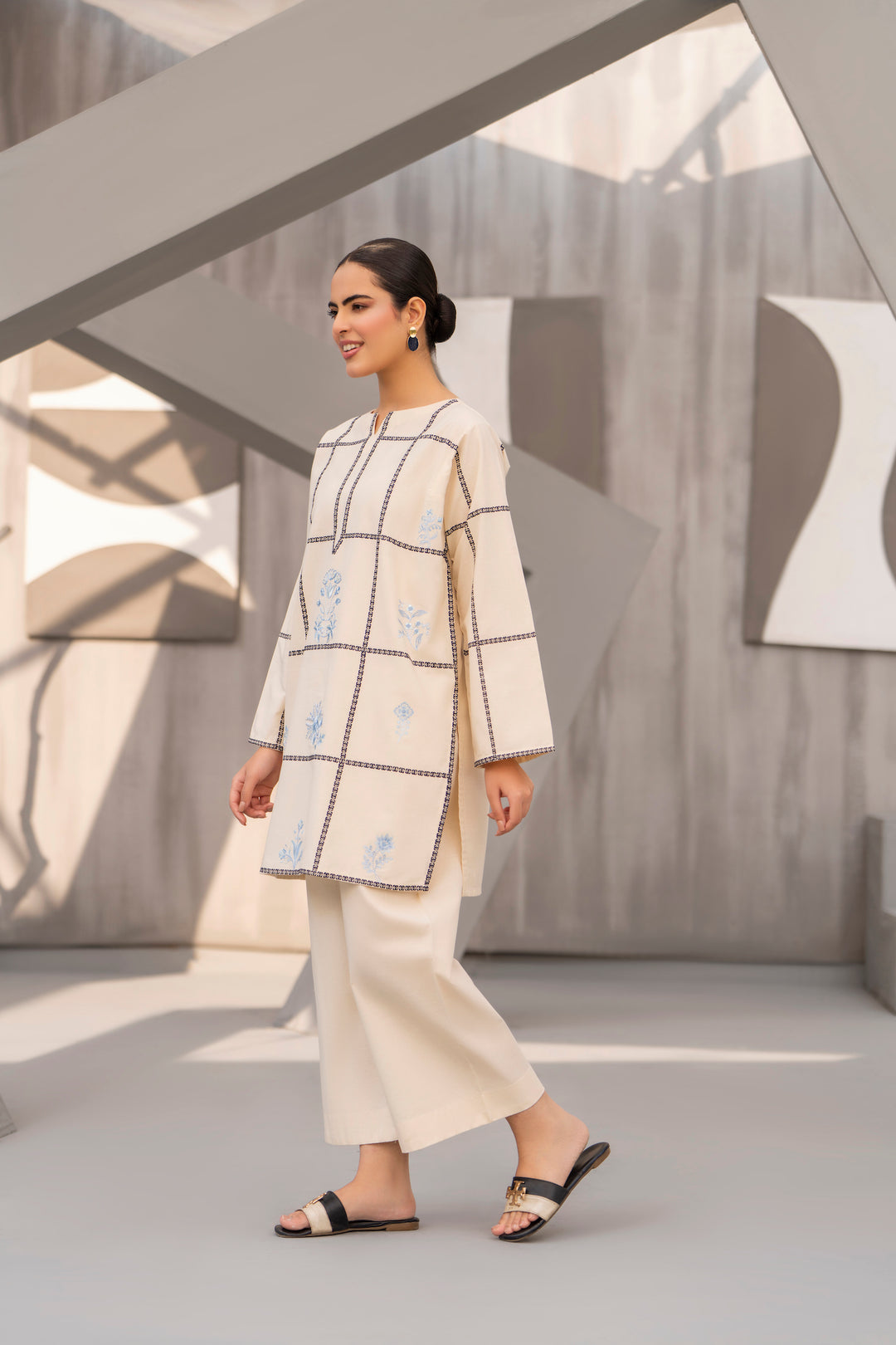 Off white embroidered khaddar 2pc