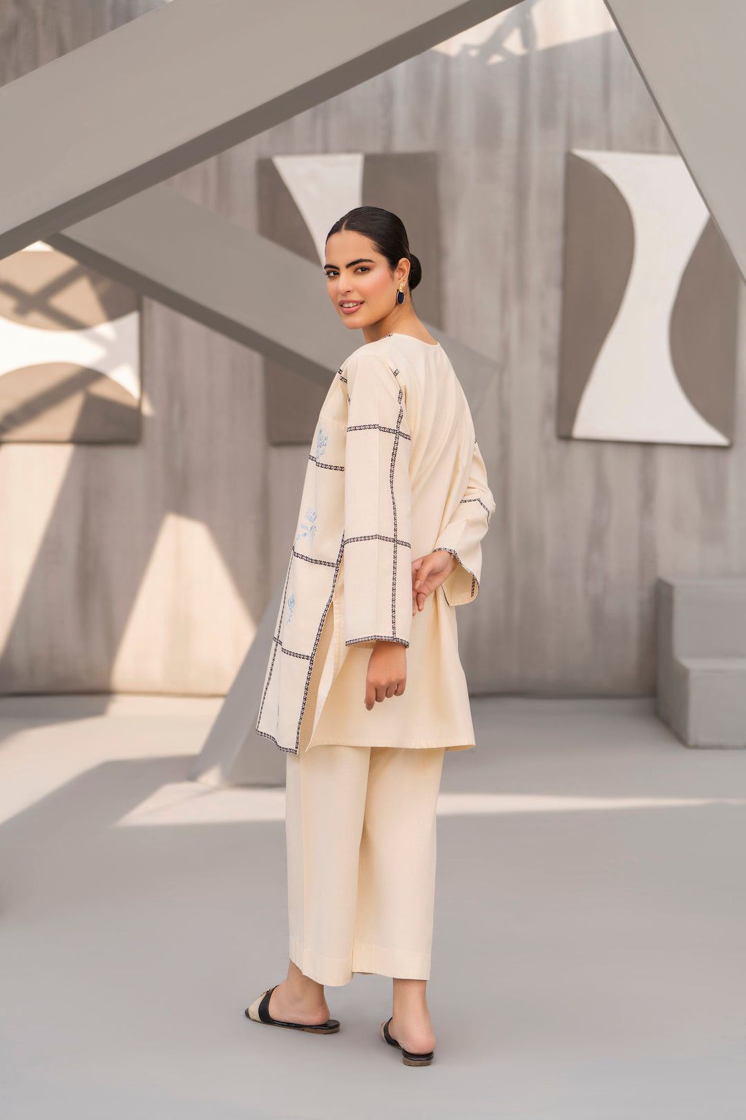 Off white embroidered khaddar 2pc